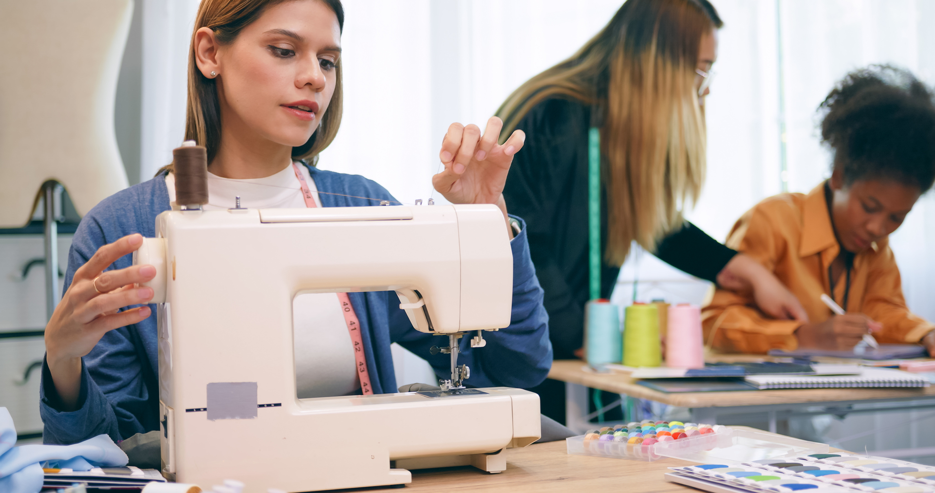 1920-a-group-of-young-women-are-learning-the-profession-of-design-and-tailoring.JPG