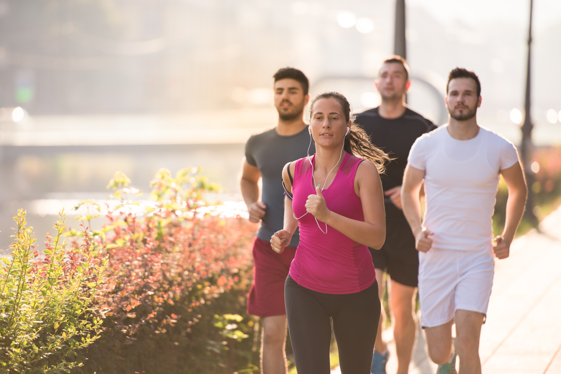 1920-group-of-young-people-jogging-in-the-city.jpg