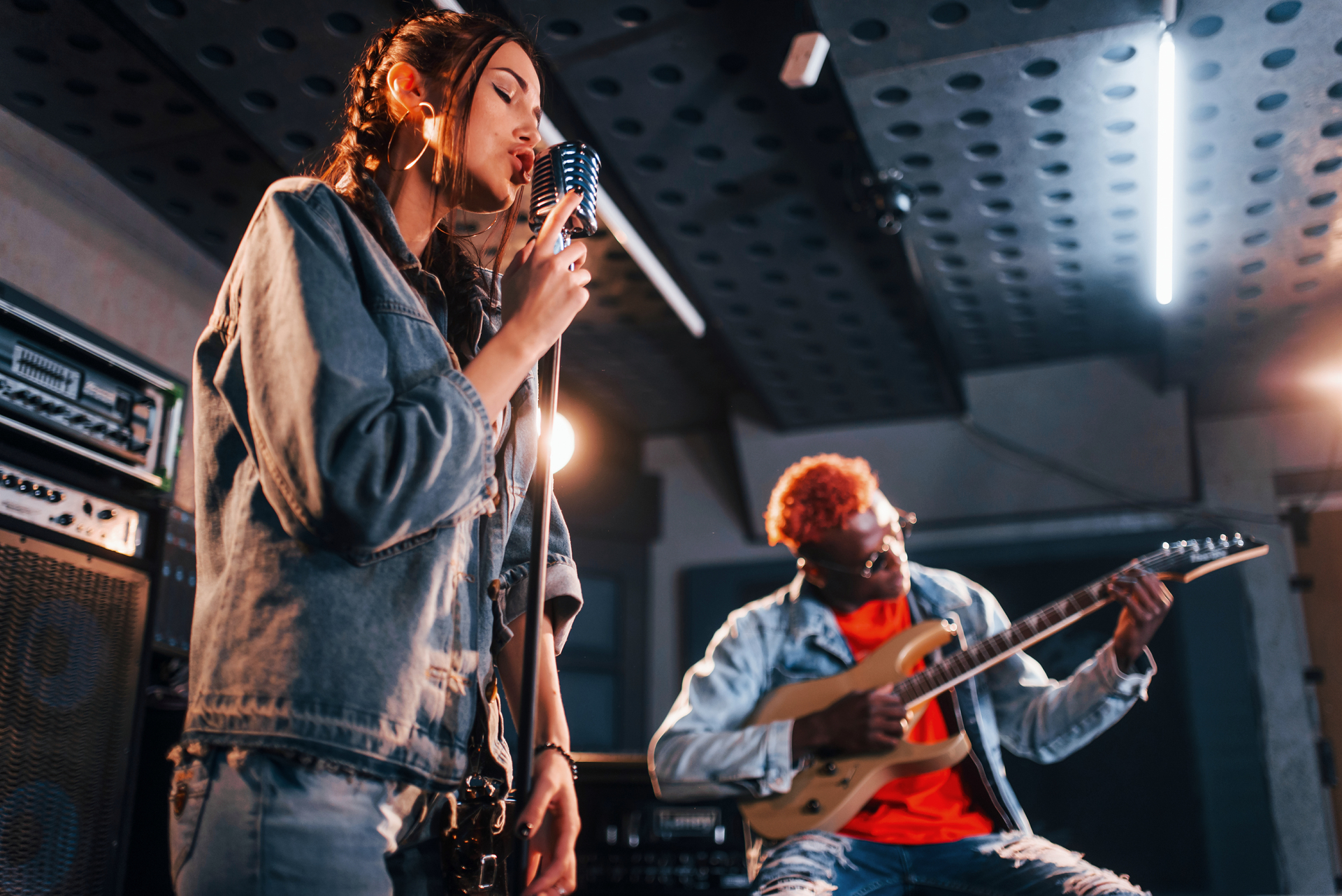 1920-guy-plays-guitar-girl-sings-african-american-man-with-white-girl-rehearsing-in-the-studio-together.jpg