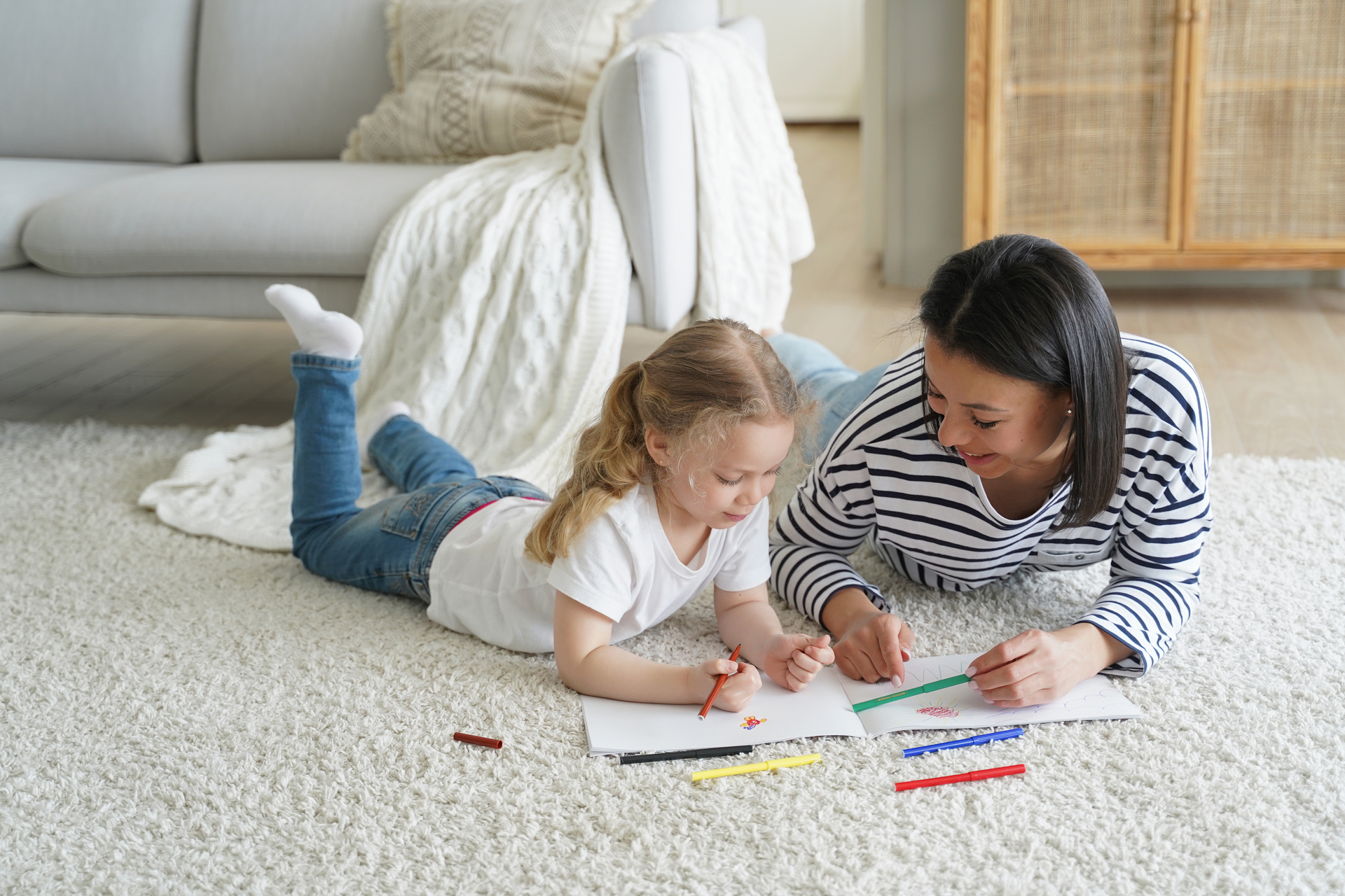 1920-kid-girl-daughter-and-mom-drawing-painting-lying-on-floor-carpet-together-children-s-education.JPG