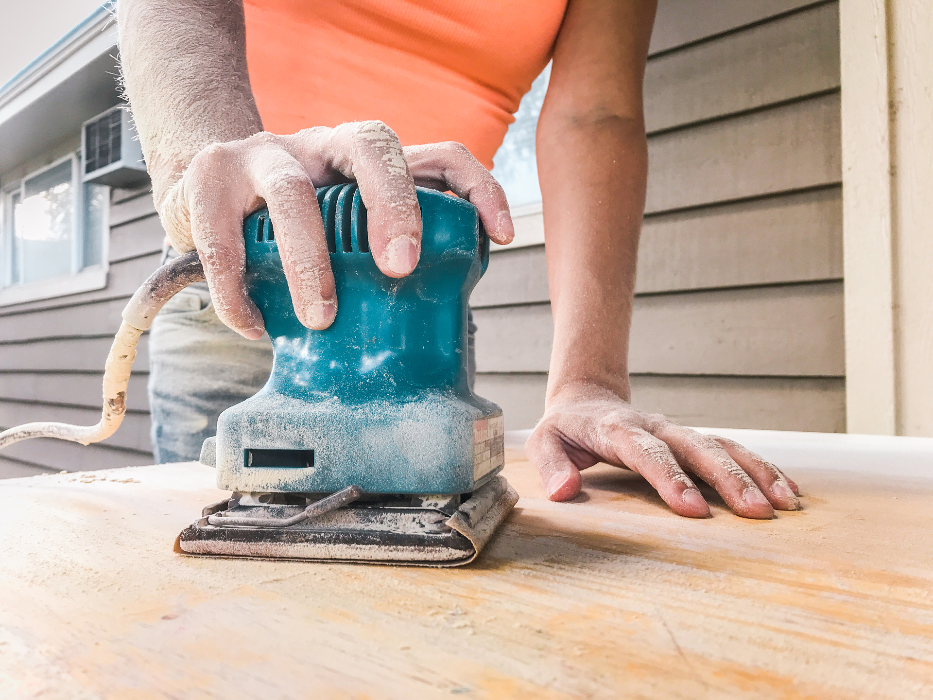 1920-person-refinishing-furniture.jpg