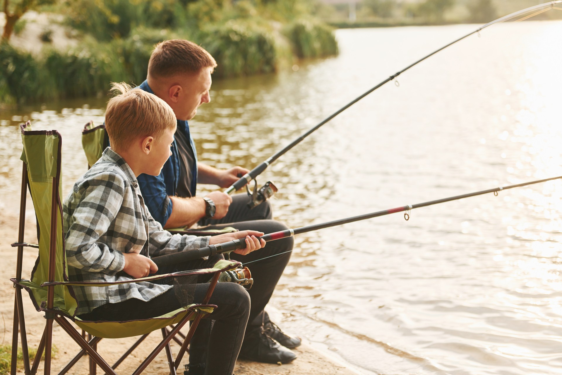 1920-resting-and-having-fun-father-and-son-on-fishing-together-outdoors-at-summertime.jpg