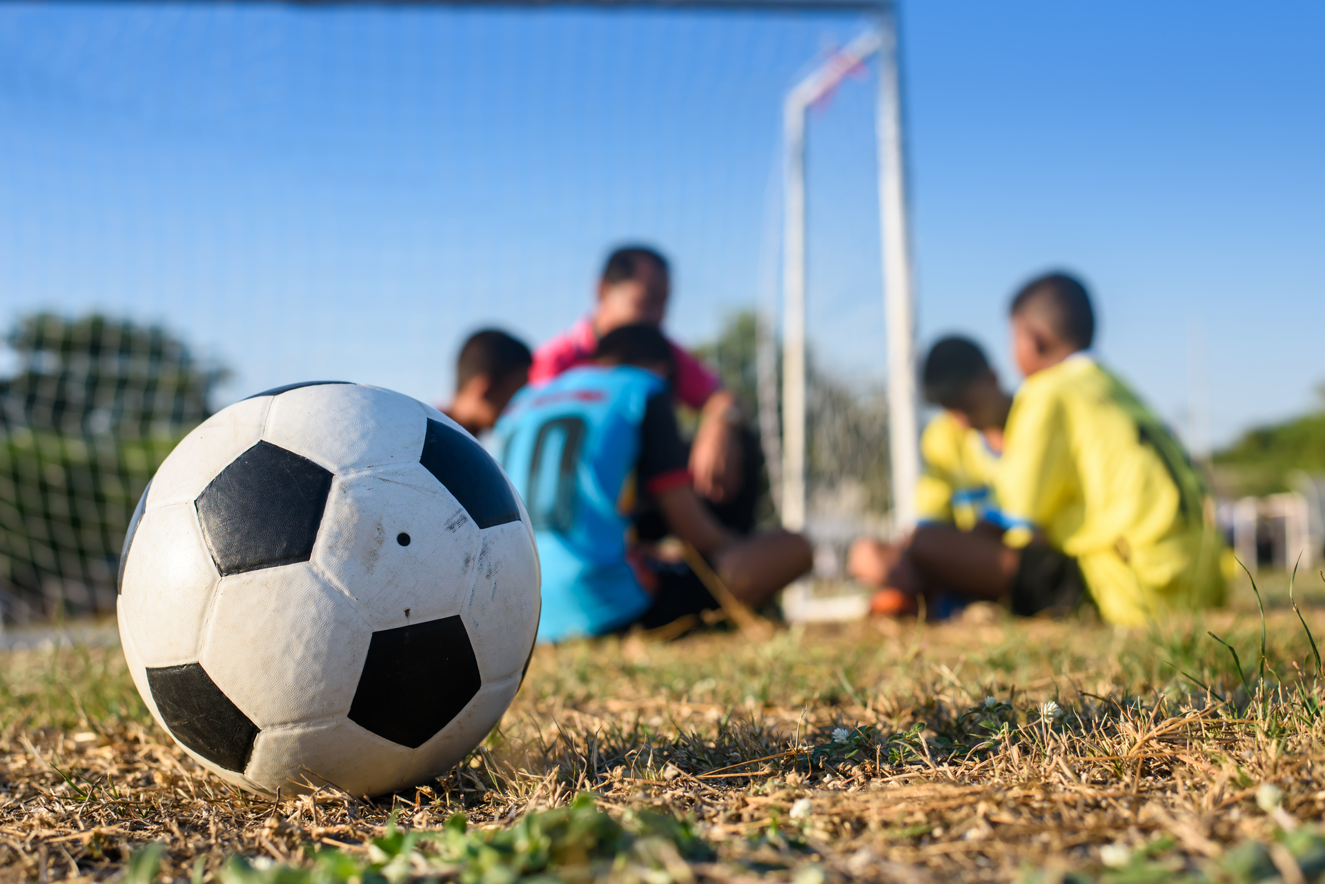 1920-soccer-ball-and-sports-teacher-and-student-background.jpg