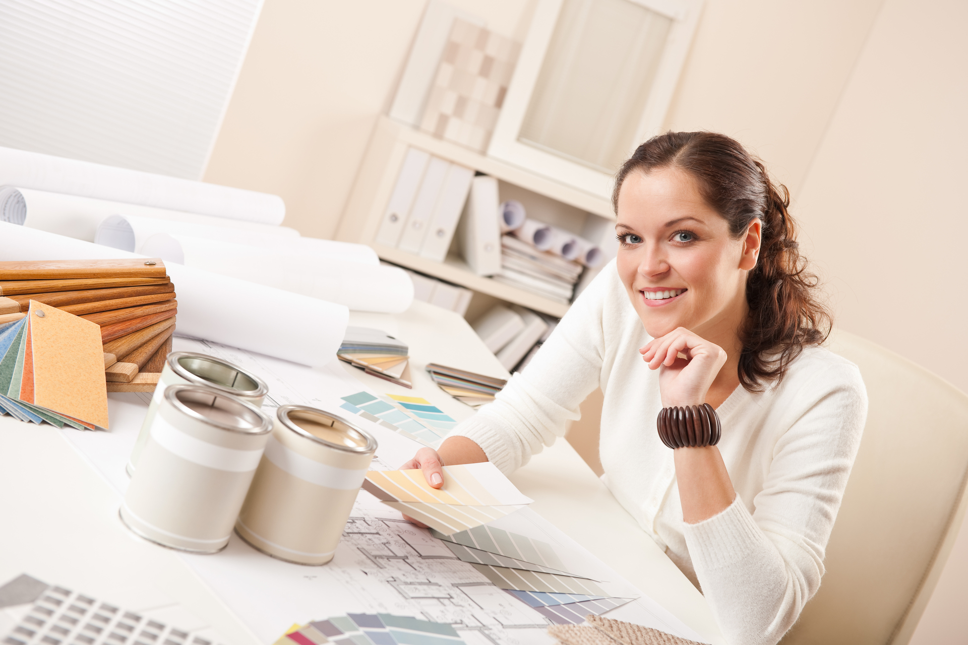 1920-woman-at-her-office-doing-interior-design.jpg