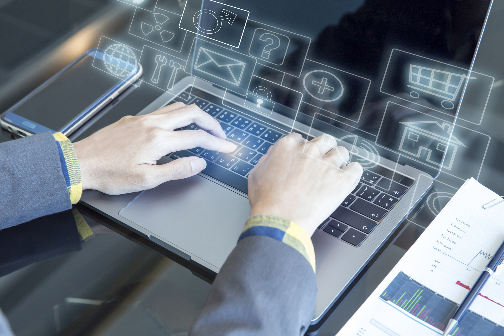 1920-woman-using-a-computer-with-icons-floating.jpg