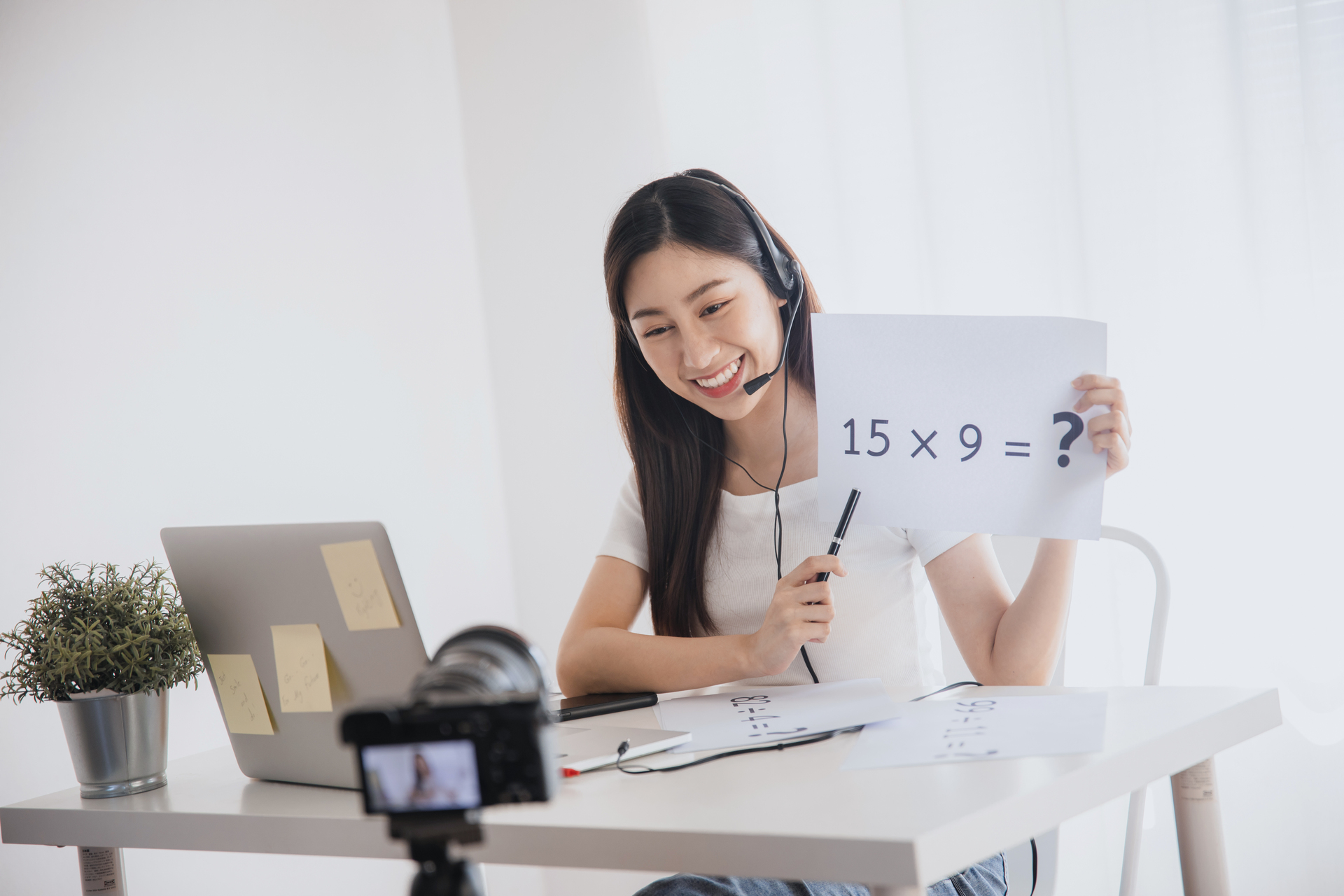 1920-young-beautiful-asian-teacher-woman-teach-math-online-and-look-at-laptop-to-chat-with-student-in-front-of-camera-during-quarantine-and-work-from-home.JPG