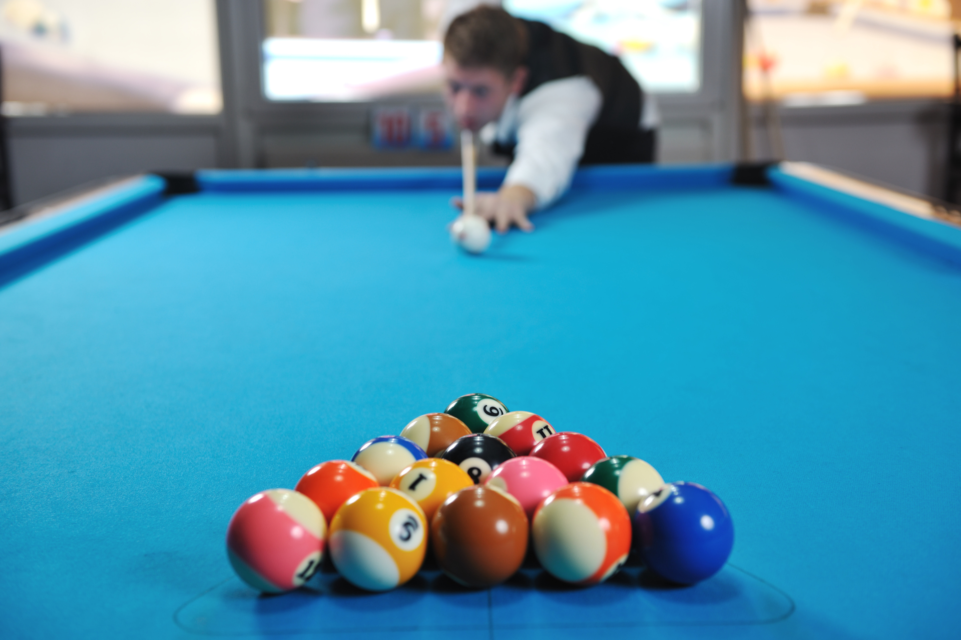 1920-young-man-play-pro-billiard-game.jpg